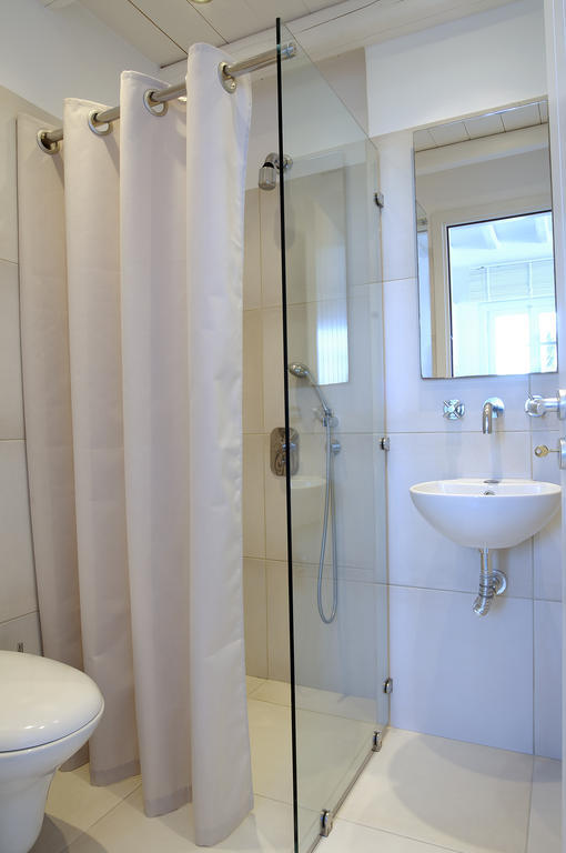 Kapetan Tasos Suites Поллония Номер фото